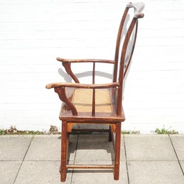 A Chinese elm wood "official's hat" armchair, 19th C.