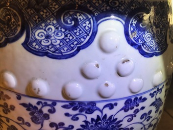 A Chinese blue and white 'lotus scroll' garden seat, Qianlong