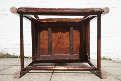 A Chinese elm wood "official's hat" armchair, 19th C.