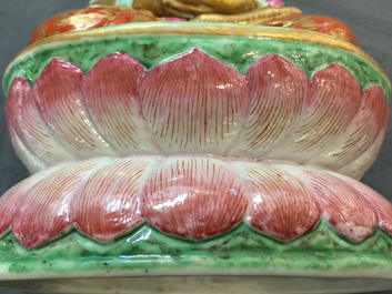 A Chinese parcel-gilt famille rose model of Buddha, 19th C.