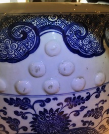 A Chinese blue and white 'lotus scroll' garden seat, Qianlong