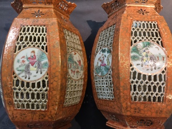 A pair of Chinese famille rose coral-ground lanterns, 19/20th C.
