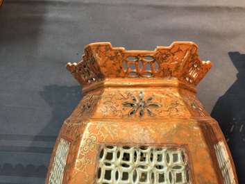 A pair of Chinese famille rose coral-ground lanterns, 19/20th C.