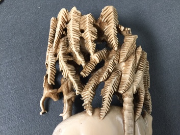 A Chinese carved ivory group of a lady with an elephant, 1st half 20th C.
