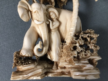 A Chinese carved ivory group of a lady with an elephant, 1st half 20th C.