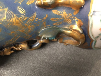 Three Chinese famille verte on gilt blue-ground vases, 19th C.