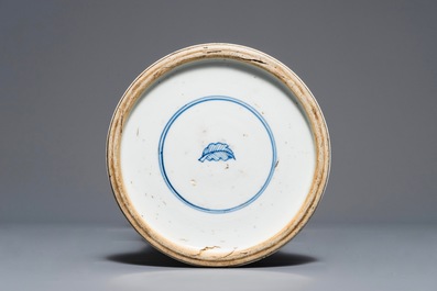 A clobbered Chinese blue and white 'gu' beaker vase, Kangxi