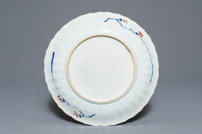 Un plat en porcelaine de Chine famille verte aux armes de Louvain, Kangxi/Yongzheng