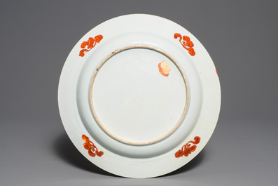 A fine Chinese famille rose dish with figures in a garden, Yongzheng