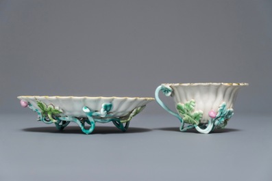 A Chinese famille rose lotus-shaped relief-decorated cup and saucer, Yongzheng