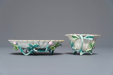 A Chinese famille rose lotus-shaped relief-decorated cup and saucer, Yongzheng