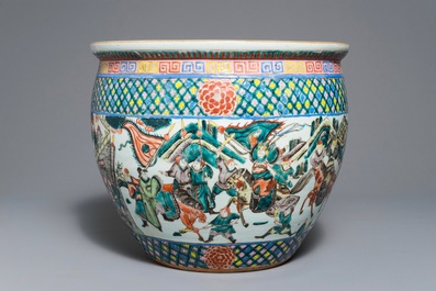 A Chinese famille verte fish bowl with warriors, 19th C.
