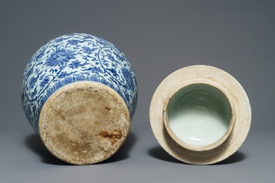 A tall Chinese blue and white 'lotus scroll' vase and cover, Kangxi