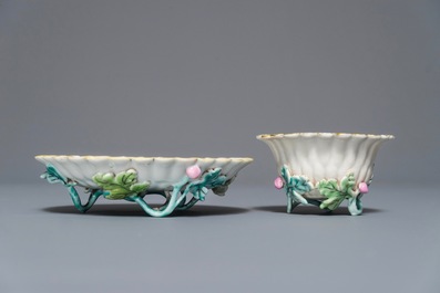 A Chinese famille rose lotus-shaped relief-decorated cup and saucer, Yongzheng