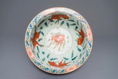 A Chinese famille verte fish bowl with warriors, 19th C.