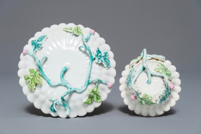 A Chinese famille rose lotus-shaped relief-decorated cup and saucer, Yongzheng