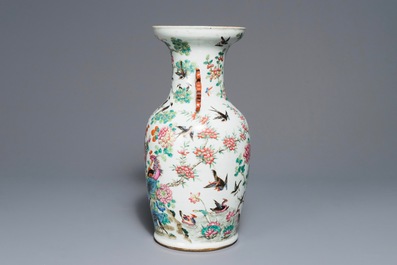 A Chinese famille rose 'phoenixes and pheasants' vase, 19th C.