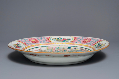 A massive Chinese famille rose 'horseriders' dish, Yongzheng