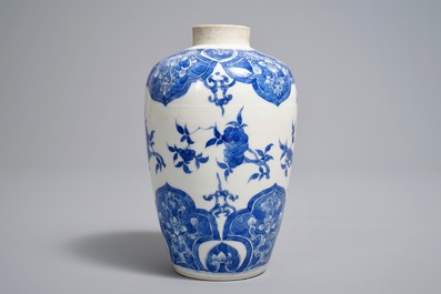 A Chinese blue and white vase with floral design, 18/19th C.