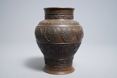 A Sino-Tibetan bronze vase with applied design of mythical beasts, 18/19th C.