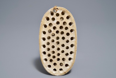A polychrome Dutch Delft petit feu and dor&eacute; brush back, 18th C.