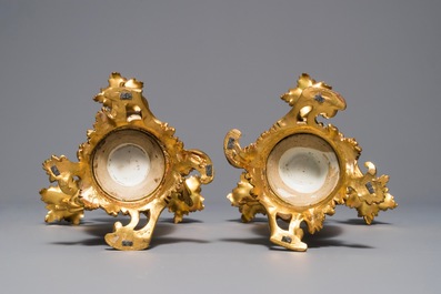 Une paire de vases en porcelaine de Chine famille rose mont&eacute;s comme candelabres, Yongzheng