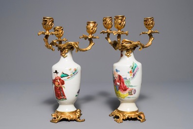 Une paire de vases en porcelaine de Chine famille rose mont&eacute;s comme candelabres, Yongzheng