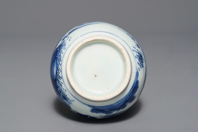A Chinese blue and white double gourd vase with figures in a landscape, Transitional period