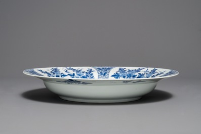 A Chinese blue and white charger with floral design, Kangxi