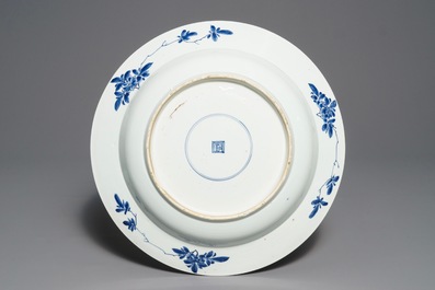 A Chinese blue and white charger with floral design, Kangxi
