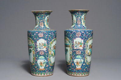 A pair of Chinese famille rose rouleau vases, 19th C.