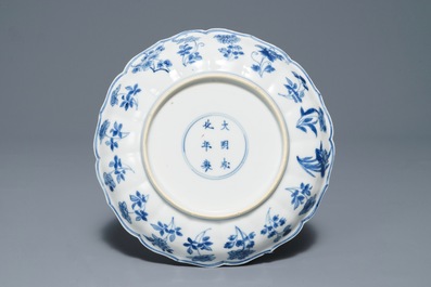 A Chinese blue and white landscape plate, Chenghua mark, Kangxi