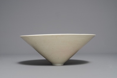 A fine Chinese qingbai conical bowl with incised floral design, Song