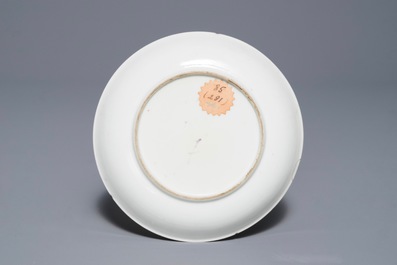 A fine Chinese famille rose 'mandarin' cup and saucer, Yongzheng/Qianlong
