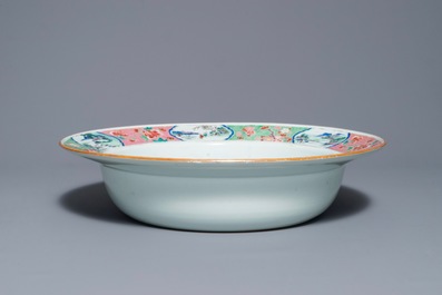 A Chinese famille rose basin with figures in a garden, Yongzheng