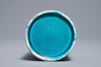 A Chinese monochrome turquoise-glazed brush pot and a plate, Kangxi
