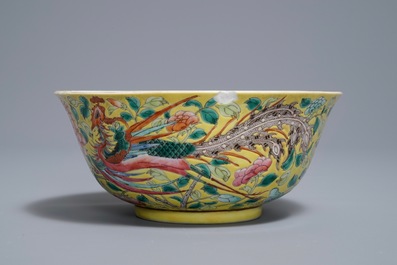 A Chinese famille rose on yellow ground 'phoenix' bowl, Qianlong mark, 19th C.