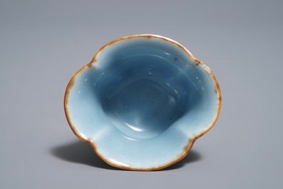 A Chinese underglaze red and blue on clair de lune ground libation cup, Qianlong mark, 18/19th C.