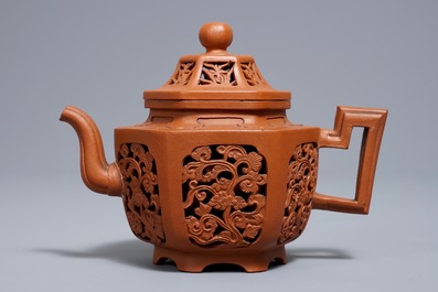 A Chinese reticulated double-walled Yixing stoneware teapot and cover, Kangxi