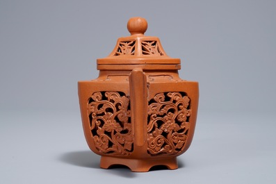 A Chinese reticulated double-walled Yixing stoneware teapot and cover, Kangxi