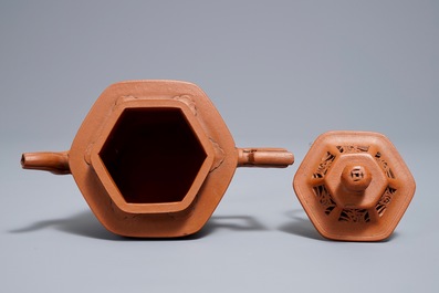 A Chinese reticulated double-walled Yixing stoneware teapot and cover, Kangxi