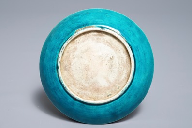 A Chinese monochrome turquoise-glazed brush pot and a plate, Kangxi