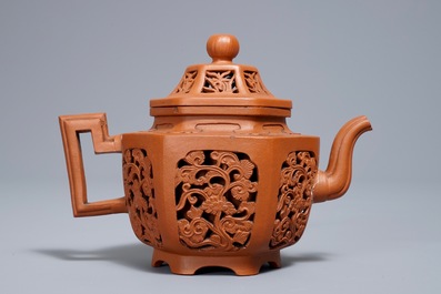 A Chinese reticulated double-walled Yixing stoneware teapot and cover, Kangxi