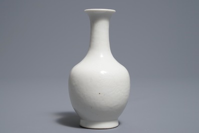 A Chinese blanc de Chine bottle vase with incised anhua design, ca. 1900