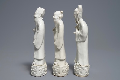 Three Chinese blanc de Chine figures of Immortals, 18/19th C.