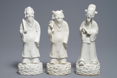 Three Chinese blanc de Chine figures of Immortals, 18/19th C.