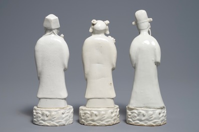 Three Chinese blanc de Chine figures of Immortals, 18/19th C.