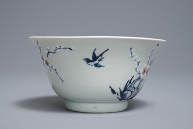 A Chinese blue, white and red on celadon ground 'prunus' bowl, Kangxi