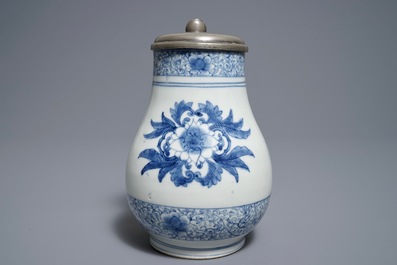 A Japanese blue and white pewter-mounted Arita jug, Edo, 17/18th C.