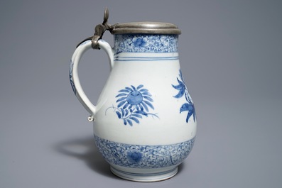 A Japanese blue and white pewter-mounted Arita jug, Edo, 17/18th C.